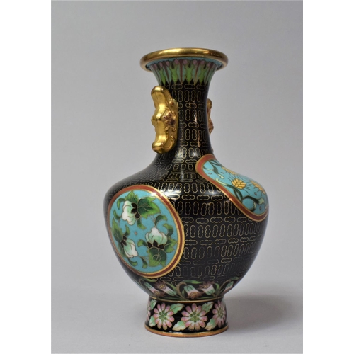 259 - An Oriental Cloisonné Enamelled Two handled Vase with Floral Cartouches, 14.5cm high