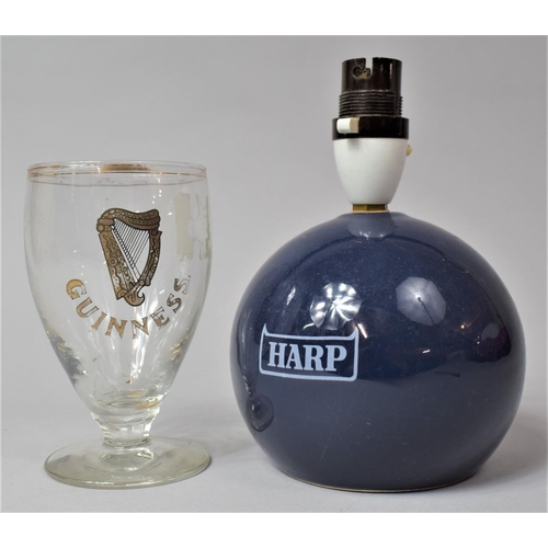 304 - A Harp Lager Blue Glazed Globular Table Lamp and a Vintage Guinness Glass