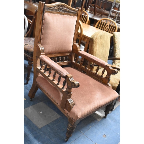 633 - A Late Victorian/Edwardian Oak Framed Armchair