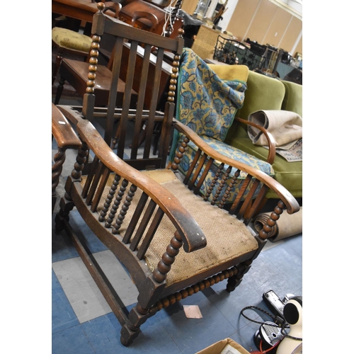 639 - An Edwardian Oak Framed Bobbin Armchair, No Cushions