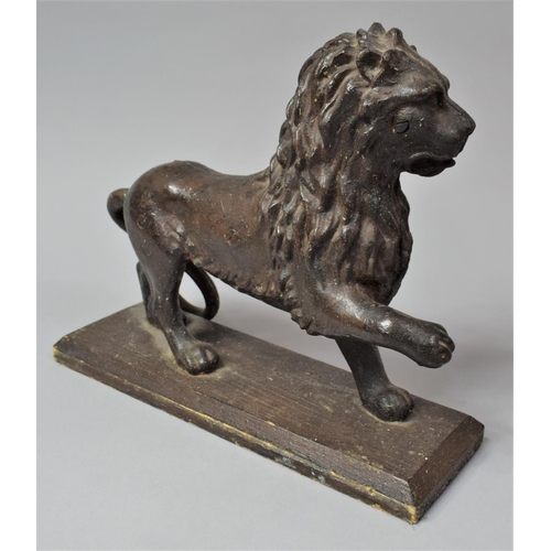 83 - An 18th Century Style Cast Metal Study of a Lion with Paw Raised and Set on Wooden Plinth Base, Tail... 