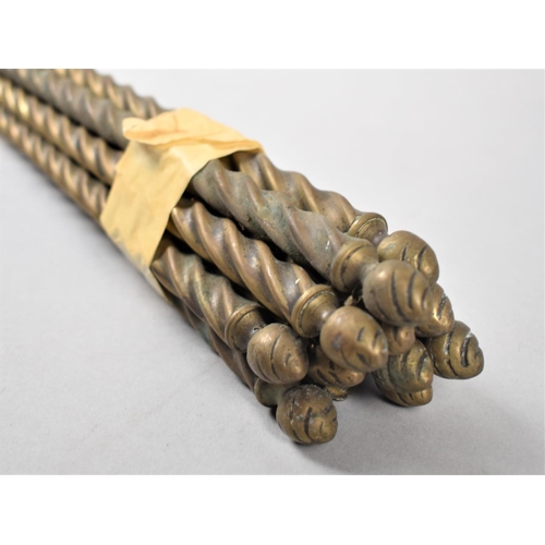 94 - A Collection of Twelve Twist Brass Stair Rods, One Missing Finial, 62cm Long