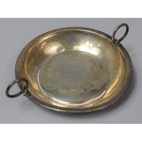385 - A Circular Silver Wine Taster or Coaster with Two Raised Handles, 9.5cm Diameter, Sheffield 1905