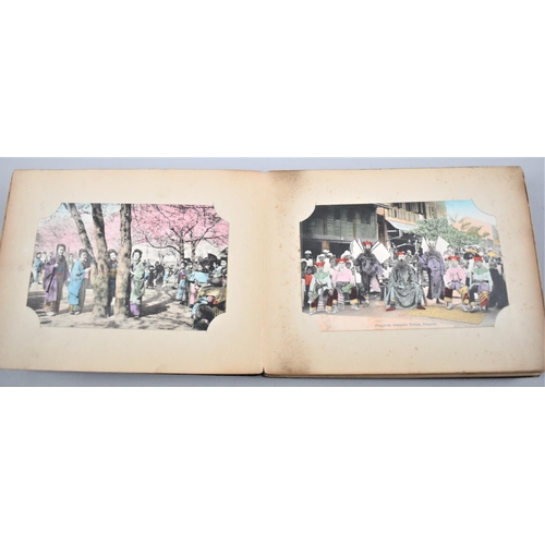 42 - A Lacquered Japanese Postcard Album Containing Coloured and Monochrome Postcards to Include Hong Kon... 