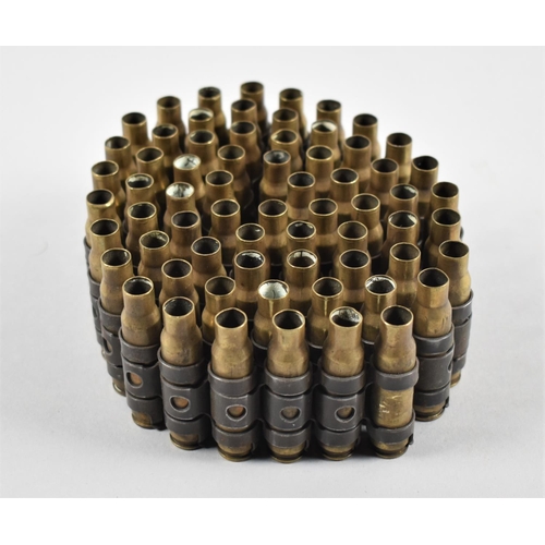 64 - A String of Spent Brass Machine Gun Bullets