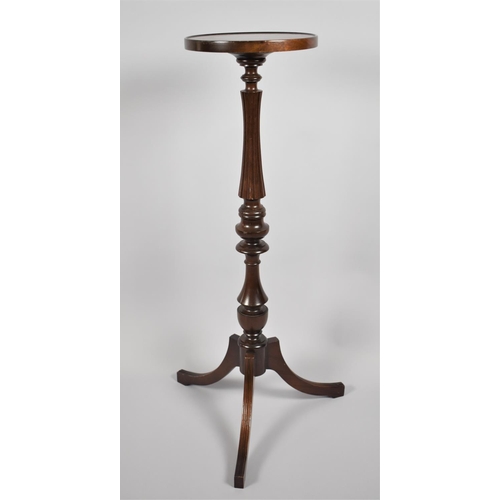 68 - A Reproduction Mahogany Circular Topped Torchere with Reeded Support and Tripod Base, 96cm high