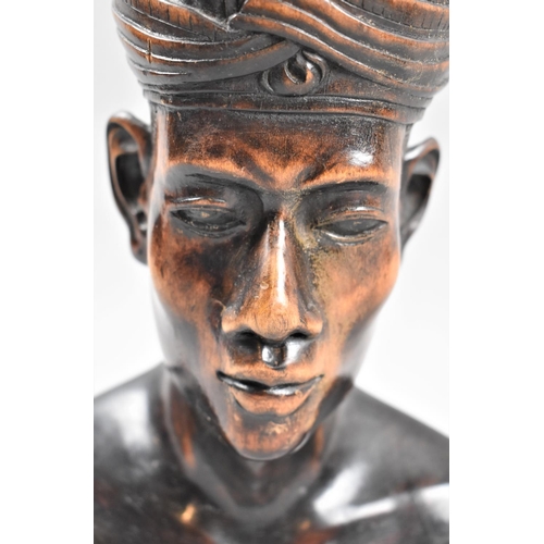 113 - A Carved Wooden Bust of a Thai Gentleman, 30cm High