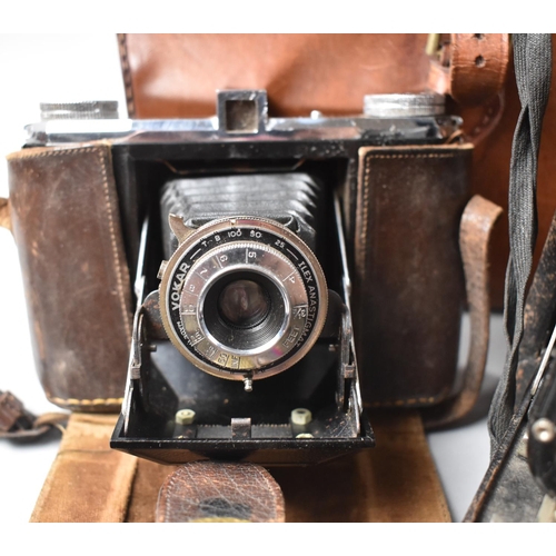 128 - A Collection of Three Vintage Cameras to Include Ilford Sportsman 1957, German Made Together with a ... 