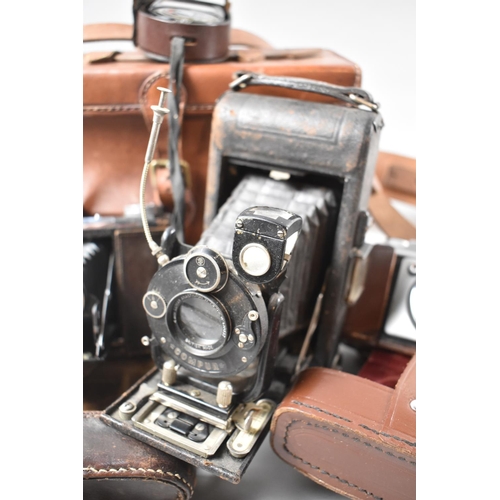 128 - A Collection of Three Vintage Cameras to Include Ilford Sportsman 1957, German Made Together with a ... 