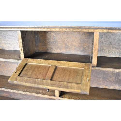 142 - An Edwardian Oak Eleven Section Open Bookcase, Top Centre Section with Hinged Panelled Pull Front Do... 