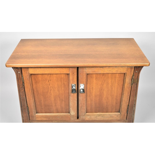 162 - A Modern Oak Side Cabinet with Two Panelled Doors to Shelved Interior, 102cm wide