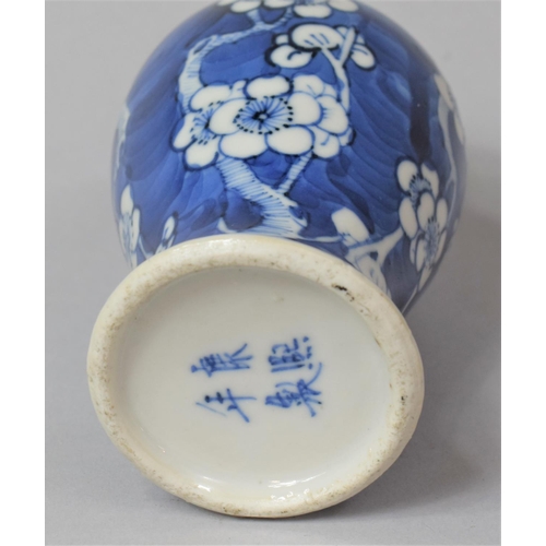 241 - A 19th Century Blue and White Prunus Pattern Vase, Four Character Mark to Base for Kangxi, 13cm high