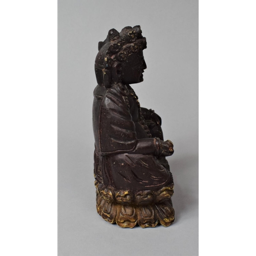 269 - A Tibetan Carved Wooden Study of Jambhala, God of Wealth, In the Seated Position with Left Hand Hold... 