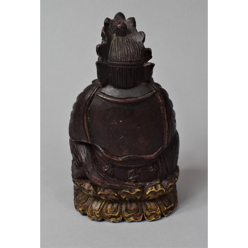 269 - A Tibetan Carved Wooden Study of Jambhala, God of Wealth, In the Seated Position with Left Hand Hold... 