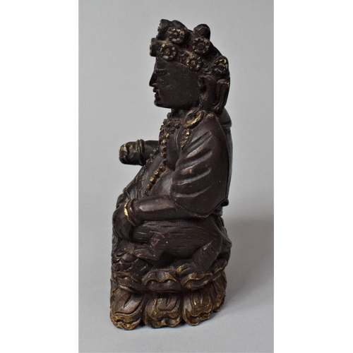 269 - A Tibetan Carved Wooden Study of Jambhala, God of Wealth, In the Seated Position with Left Hand Hold... 