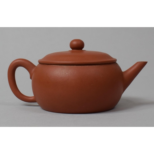 280 - A Small 20th Century Chinese Yixing Teapot with Seal Mark to Base, 6cm high