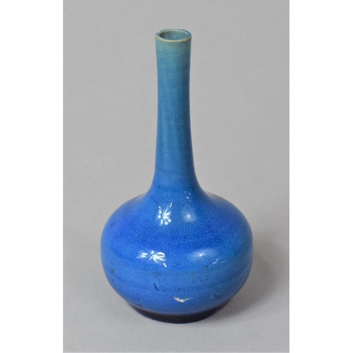 281 - A Small Chinese Monochrome Bottle Vase of Globe and Shaft Form, 10cm high, Damage to Body