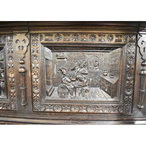 531 - A Late 19th Century Heavily Carved Oak Side Cabinet, Having Two Centre Drawers and Carved Panel Door... 