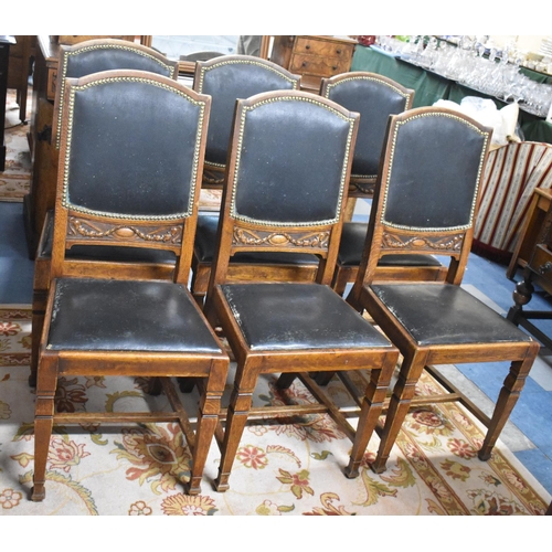 537 - A Set of Six Edwardian Oak Framed Hide Seated and Backed Dining Chairs with Carved Centre Rails and ... 