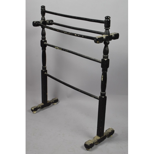 547 - An Edwardian Black Painted Towel Rail, 68cm wide