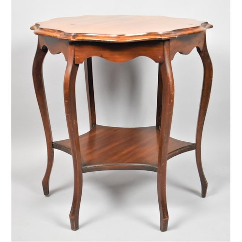 551 - An Edwardian Circular Topped Occasional Table in Mahogany with Cabriole Supports, 69cm Diameter