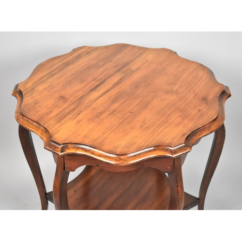 551 - An Edwardian Circular Topped Occasional Table in Mahogany with Cabriole Supports, 69cm Diameter