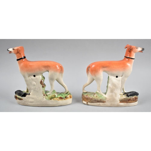 72 - A Pair of Late 19th Century Staffordshire Greyhounds, 18cm high