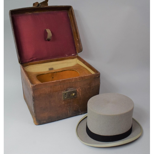 94 - A Late 19th Century Leather Hat Box Containing a Later Grey Top Hat, 35cm wide