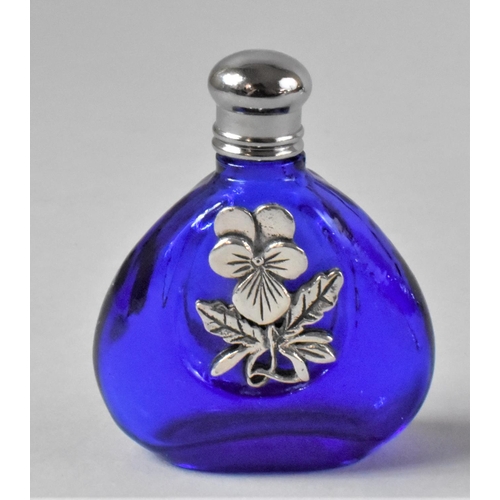 417 - A Modern Small Cobalt Blue Scent Phial with Floral Decoration, 4.5cms High