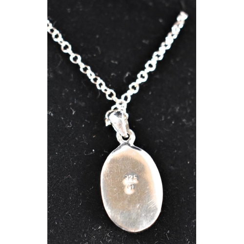 419 - A Silver and Opal Oval Pendant on Chain, Stamped 925