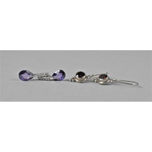 430 - Two Pairs of Silver Earrings, One Set with Amethyst and the other with Garnet