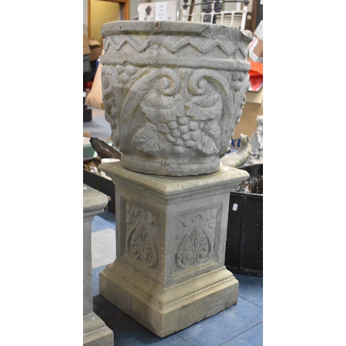 447 - A Reconstituted Stone Garden Planter with Moulded Vine and Grape Decoration, 41cms Diameter and 39cm... 