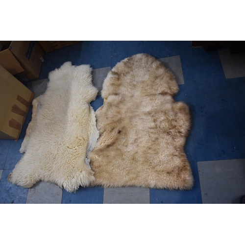 467 - Two Sheepskin Rugs, Sheep Skin Ladies Hat and Faux Fur Stole