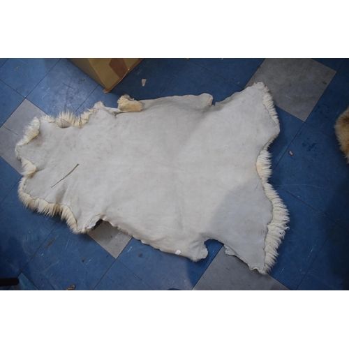 467 - Two Sheepskin Rugs, Sheep Skin Ladies Hat and Faux Fur Stole