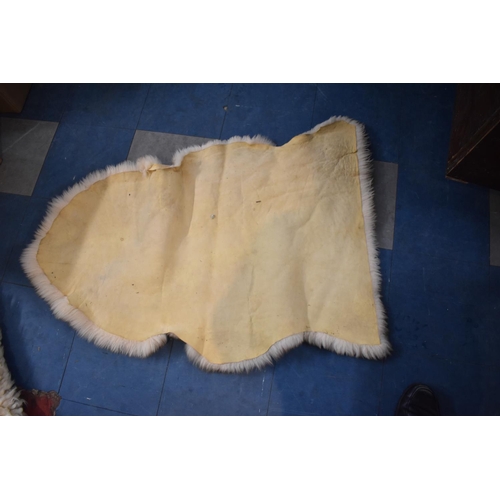 467 - Two Sheepskin Rugs, Sheep Skin Ladies Hat and Faux Fur Stole