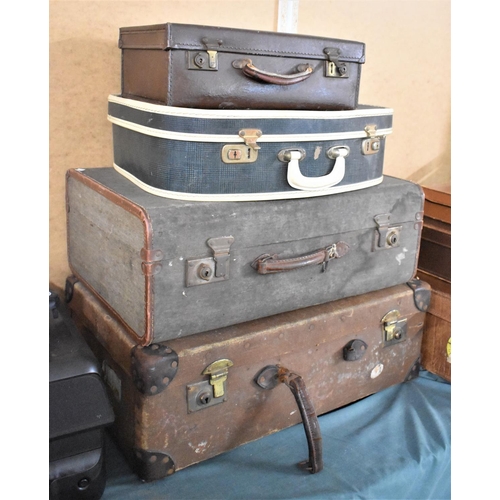 479 - A Collection of Four Vintage Suitcases, The Largest 86cms Wide