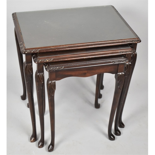 504 - A Nest of Three Mahogany Tables, The Largest 54cms Wide