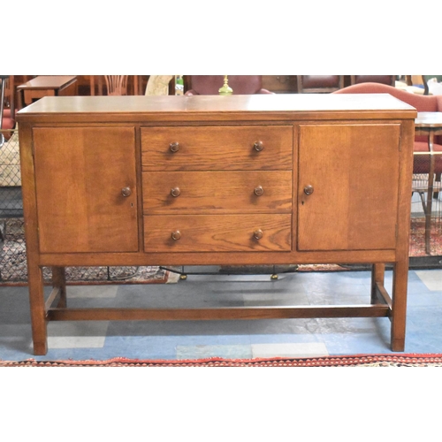 514 - A Mid 20th Century Oak Sideboard, Having Three Central Drawers Flanked by Cupboards, 148cms Wide