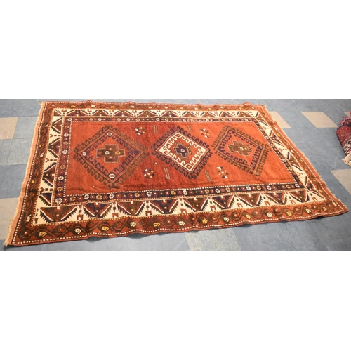 527 - An antique Caucasian Kazak Hand Made Rug, 212x145cms