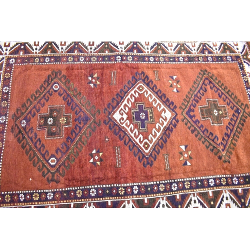 527 - An antique Caucasian Kazak Hand Made Rug, 212x145cms