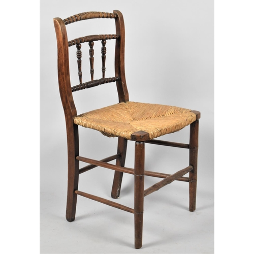 530 - A Late Victorian/ Edwardian Rush Seated Side Chair