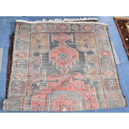 532 - An antique Persian Hand Made Kurdish Rug, 210x104cms