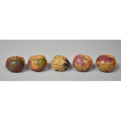 316 - A Collection of Five Carved Netsukes in the Form of Pigs, Monkeys and a Horse in Cradled Positions
