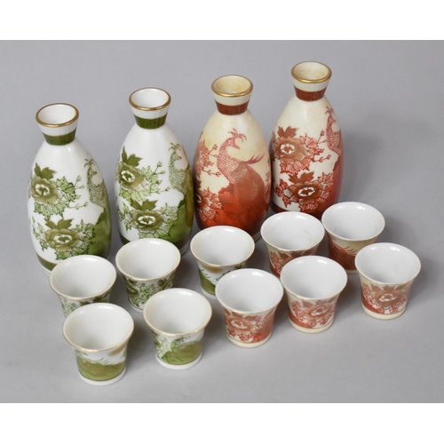 350 - Two Oriental Porcelain Decanter and Tot Sets, Two Colour Ways, Both Sets with Bird Decoration in Ora... 