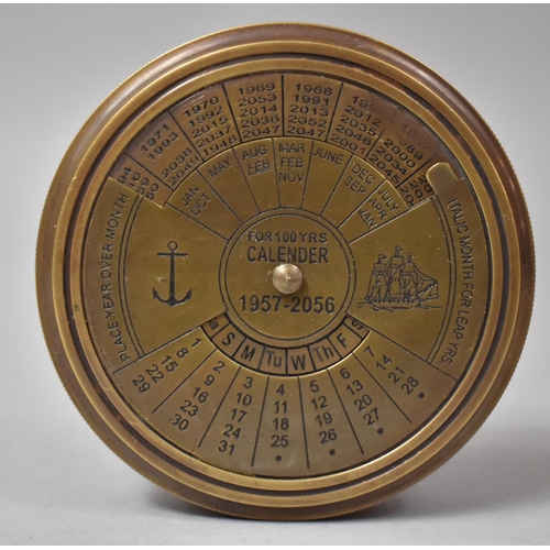 106 - A Reproduction Brass Circular Compass and Hundred Year Calendar, 8cm Diameter