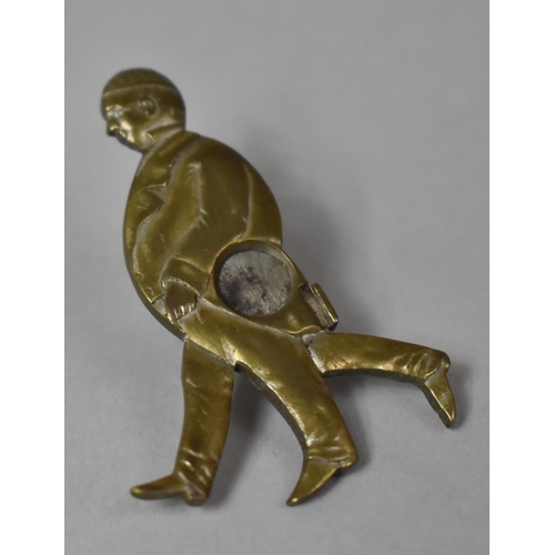 11 - A Vintage Novelty Metal Souvenir Cheroot Cutter in the Form of a Three Legged Man, 5cm high