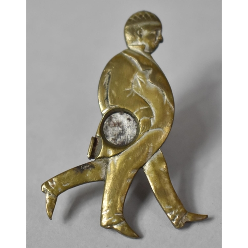 11 - A Vintage Novelty Metal Souvenir Cheroot Cutter in the Form of a Three Legged Man, 5cm high