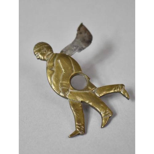 11 - A Vintage Novelty Metal Souvenir Cheroot Cutter in the Form of a Three Legged Man, 5cm high