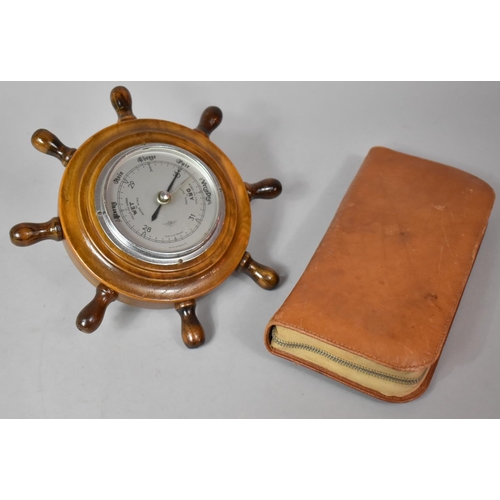 124 - A Mid 20th Century Wall Hanging Ships Wheel Barometer Together with a Leather Cased Gents Travelling... 