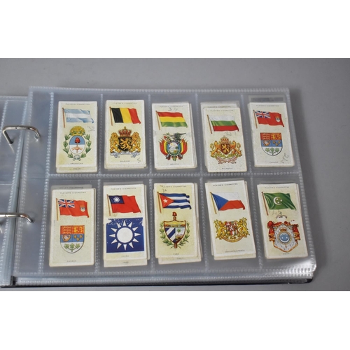 262 - A Ring Binder Containing Part Sets of Cigarette Cards etc